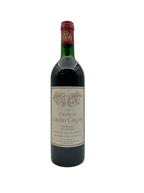 Flaske af Chateau Grand Canyon 1990 rødvin fra Pauillac