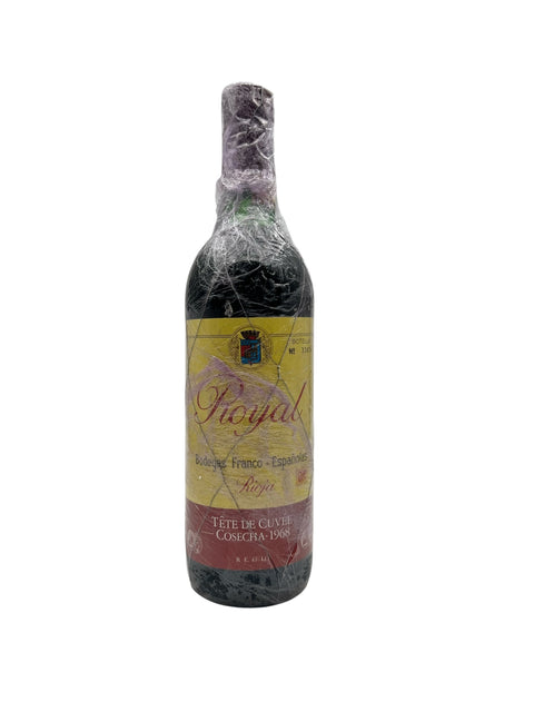 Flaske af Royal Bodegas Franco Españolas 1968 rødvin indpakket i plastik